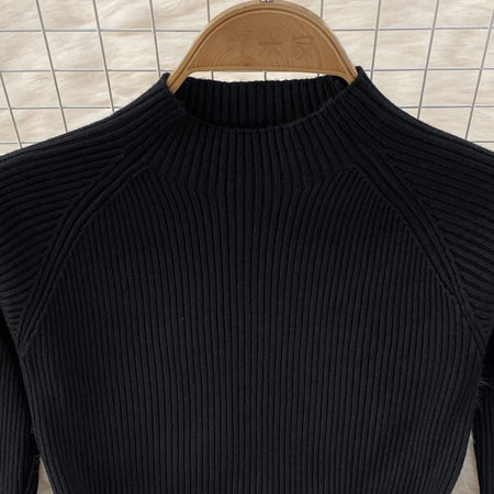 Sasha Pleated Woolen Dress - close-up of neckline detail, black - Miss Mosa By Akanksha