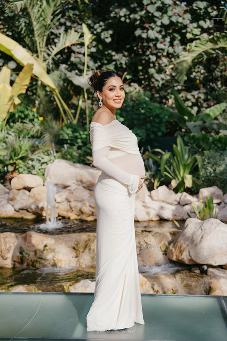 Saya Luxe Bodycon Maxi Dress - full-length side shot on model in garden, cream - Miss Mosa By Akanksha