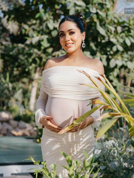 Saya Luxe Bodycon Maxi Dress - front shot on model in garden, cream - Miss Mosa By Akanksha