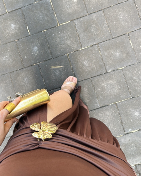 Serafina Luxe Slit Cut Maxi Dress In Brown - close-up shot of waist gathering and shell detail on model - Miss Mosa By Akanksha