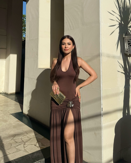 Serafina Luxe Slit Cut Maxi Dress In Brown - side shot on model with leg slit - Miss Mosa By Akanksha