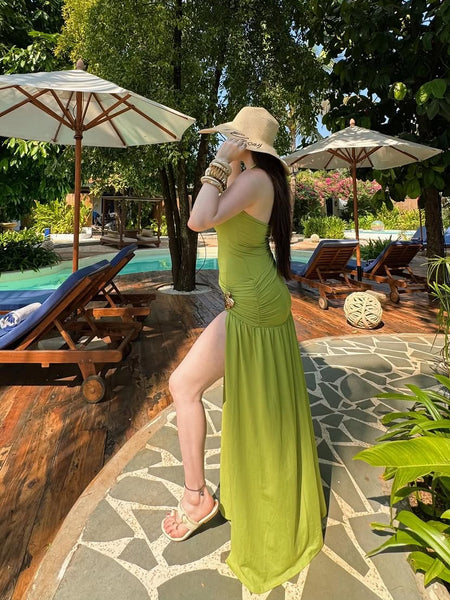 Serafina Luxe Slit Cut Maxi Dress In Green - side shot on model poolside - Miss Mosa By Akanksha
