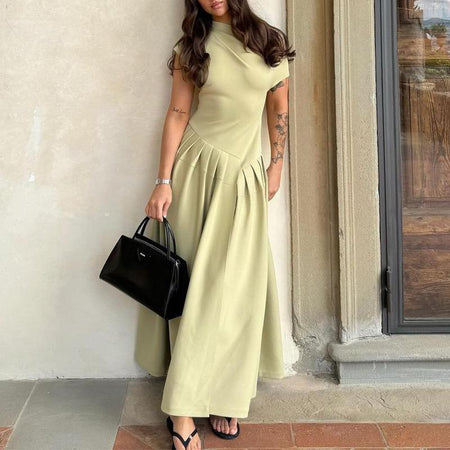 Sereia Statement Pleated Holiday Dress In Pista Green - front full-length shot on model - Miss Mosa By Akanksha