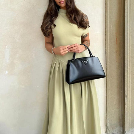 Sereia Statement Pleated Holiday Dress In Pista Green - front full-length shot on model - Miss Mosa By Akanksha