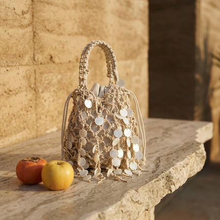 Serena Shell Crochet Pouch Handbag - three-quarter shot, cream crochet with white shell discs - Miss Mosa By Akanksha