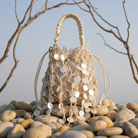 Serena Shell Crochet Pouch Handbag - front shot, cream crochet with white shell discs - Miss Mosa By Akanksha