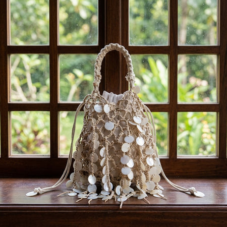 Serena Shell Crochet Pouch Handbag - front shot, cream crochet with white shell discs - Miss Mosa By Akanksha