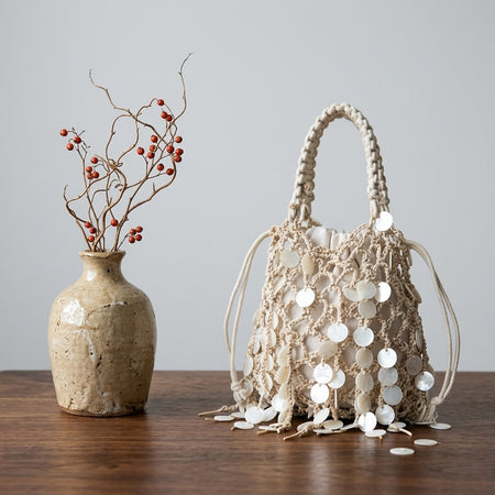 Serena Shell Crochet Pouch Handbag - front shot, cream crochet with white shell discs - Miss Mosa By Akanksha