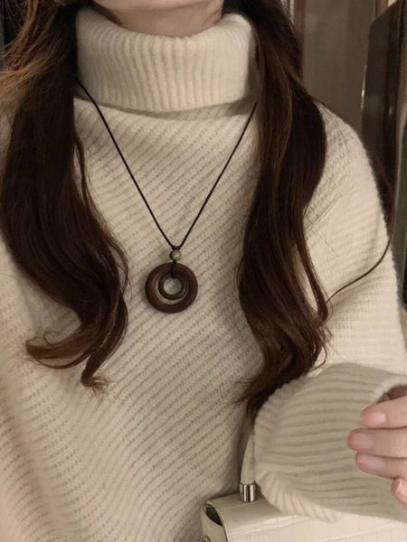Sergio Woolen High Neck Sweater - close-up of neckline on model, ivory - Miss Mosa By Akanksha