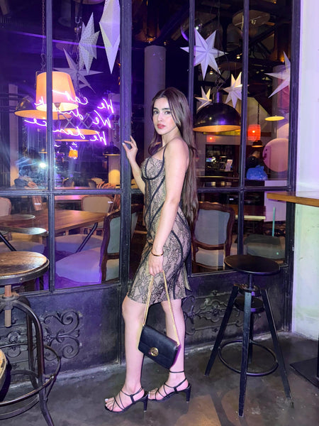 Serina Luxe Bandage Midi Dress - side shot on model outdoors, black and gold - Miss Mosa By Akanksha