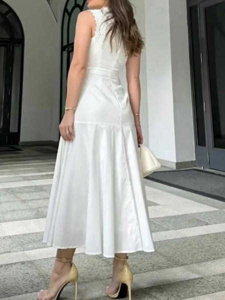 Serri Summer Holiday Dress In White - back shot on model - Miss Mosa By Akanksha