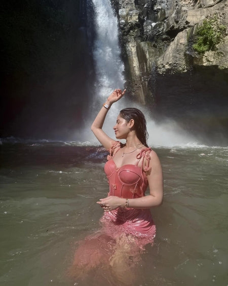 Shane Swimsuit with Sarong Skirt In Pink - front shot on model in water - Miss Mosa By Akanksha