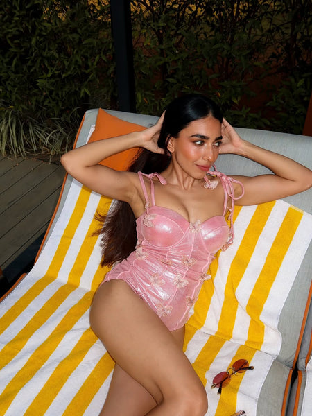 Shane Swimsuit with Sarong Skirt In Pink - front shot on model reclining - Miss Mosa By Akanksha
