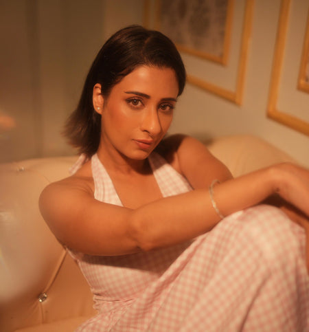 Shireen Drop Waist Midi Dress In Pink - close-up shot on model seated indoors - Miss Mosa By Akanksha