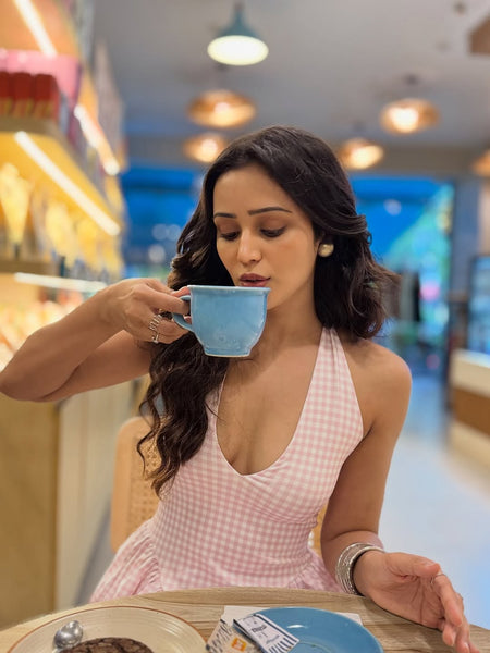 Shireen Drop Waist Midi Dress In Pink - front shot on model drinking from a cup - Miss Mosa By Akanksha