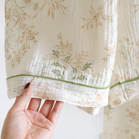 Soko Floral Cotton Nightsuit Set of 3 In Off-White - close-up of the green-piped hem detail - Miss Mosa By Akanksha