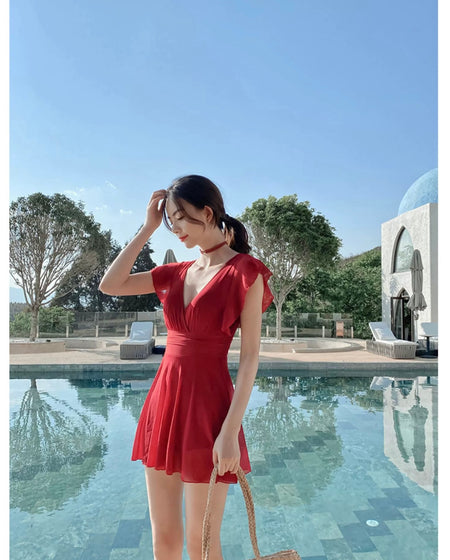 Soneva Holiday Swimsuit - side shot on model, red - Miss Mosa By Akanksha