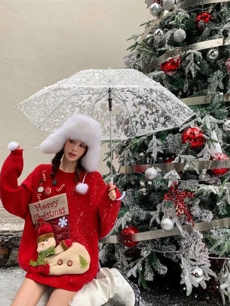 Soren Cute Christmassy Sweaters - styling shot on model outdoors, red - Miss Mosa By Akanksha