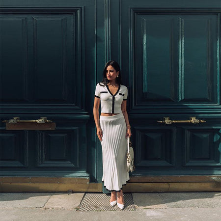 Soria Luxe Soft Knit Coord Set- Set Of Skirt And Top In Off White - full-length front shot on model on a street - Miss Mosa By Akanksha