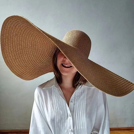 Sula Oversized Summer Holiday Straw Hat In Brown - front shot on model, brown - Miss Mosa By Akanksha