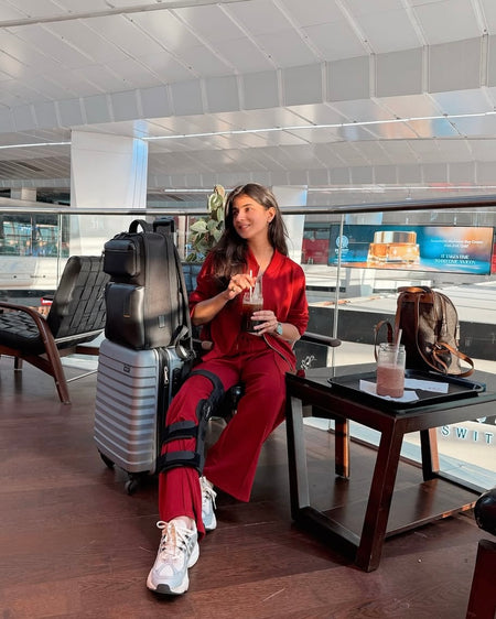 Suya Comfortable Premium Trackset - styling shot on model seated, maroon - Miss Mosa By Akanksha