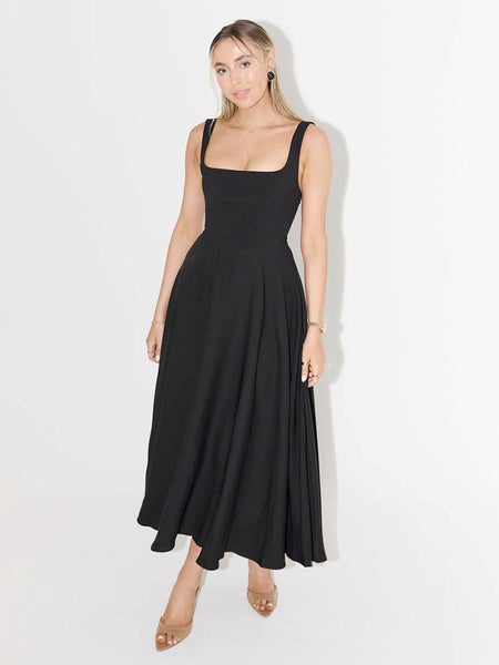 Suzanne Luxe Statment Holiday Dress In Black - front shot on model - Miss Mosa By Akanksha