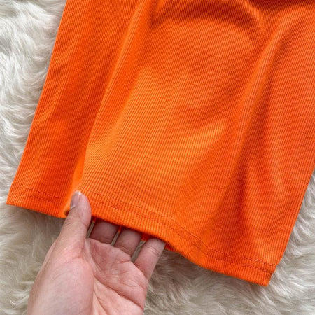 Suzie Tube Bodycon Dress In Orange - close-up of hem, orange - Miss Mosa By Akanksha