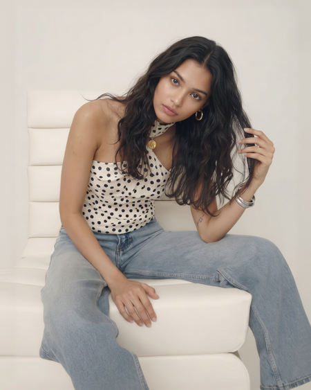 Taurel Halterneck Polka Top - seated three-quarter shot, cream with black polka dots - Miss Mosa By Akanksha