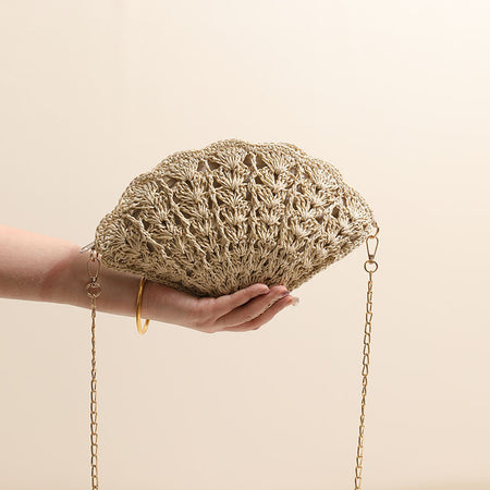 Twirly Shell Sling Bag With Chain - front shot held in hand, beige - Miss Mosa By Akanksha