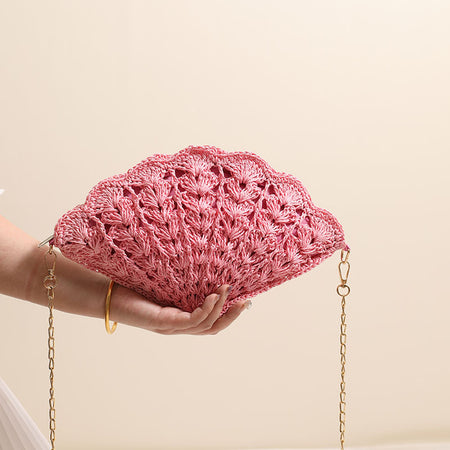 Twirly Shell Sling Bag With Chain - front shot held in hand, pink - Miss Mosa By Akanksha