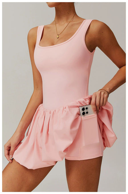 Venessa Statement Balloon Dress With Attached Short In Pink - side shot on model showing inner shorts pocket - Miss Mosa By Akanksha