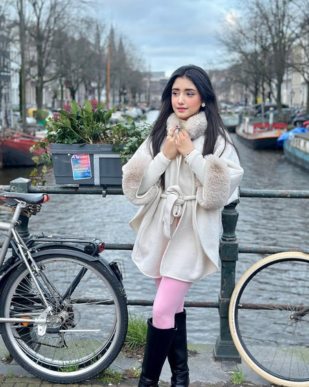 Violetta Premium Winter Capes with Fur Detailing - styling shot on model outdoors, cream - Miss Mosa By Akanksha