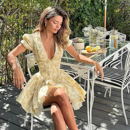 Vironica Floral Summer Dress In Yellow - styling shot on model outdoors - Miss Mosa By Akanksha