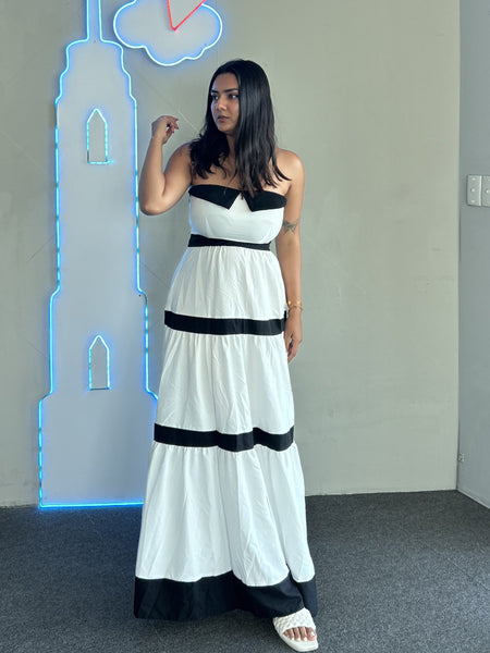 Wesley Offshoulder Holiday Maxi Dress In White - front shot on model indoors - Miss Mosa By Akanksha