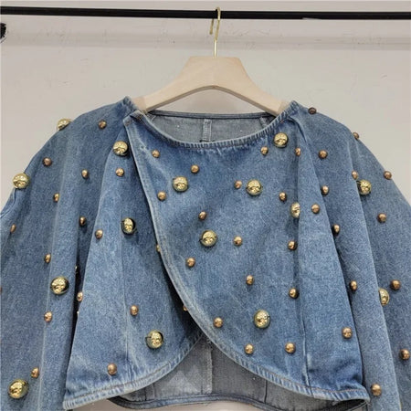 Yasmin Embellished Denim Blouse - close-up shot of studded blouse on hanger, blue denim - Miss Mosa By Akanksha