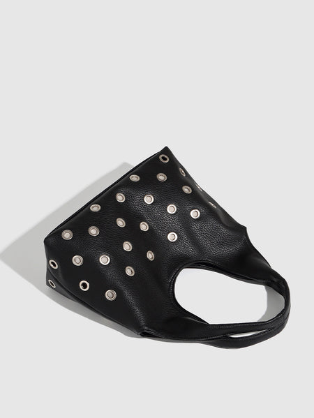 Zod Rivet PU Tote Bag - angled top-down product shot, black - Miss Mosa By Akanksha