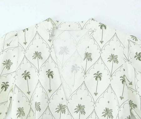 Zoey Summer Holiday Dress In Beige - close-up shot of neckline and print - Miss Mosa By Akanksha