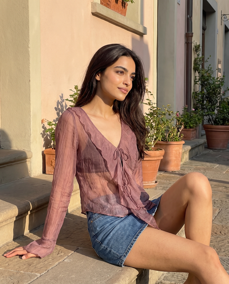 Zoya Ruffle Summer Shrugs - seated shot on model, dusty mauve pink - Miss Mosa By Akanksha