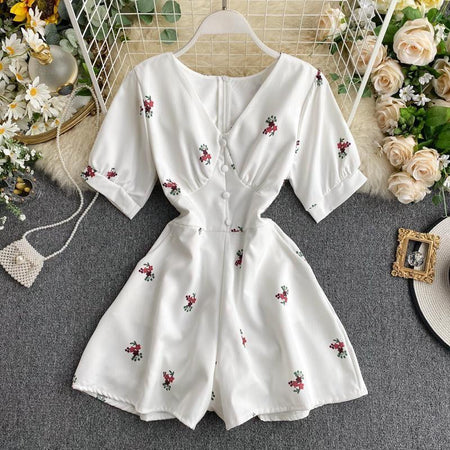 Alicia Floral Romper - back shot on hanger, white floral - Miss Mosa By Akanksha