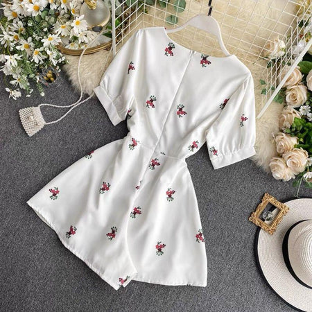 Alicia Floral Romper - back shot on hanger, white floral - Miss Mosa By Akanksha