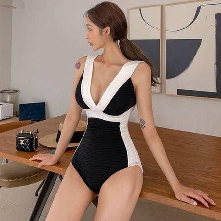 Ariel One Piece Swimsuit In Black - side shot on model, black - Miss Mosa By Akanksha