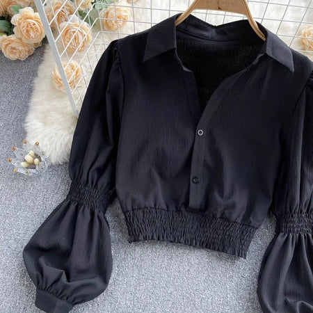 Astley Buttoned Y2K Summer Top - front shot on hanger, black - Miss Mosa By Akanksha