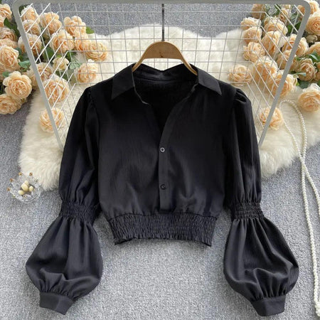 Astley Buttoned Y2K Summer Top - front shot on hanger, black - Miss Mosa By Akanksha