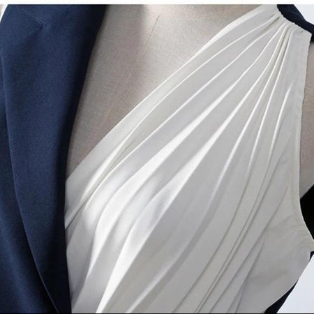 Bracello Half and Half Blouse In Black - close-up of pleated panel detail, navy and white - Miss Mosa By Akanksha