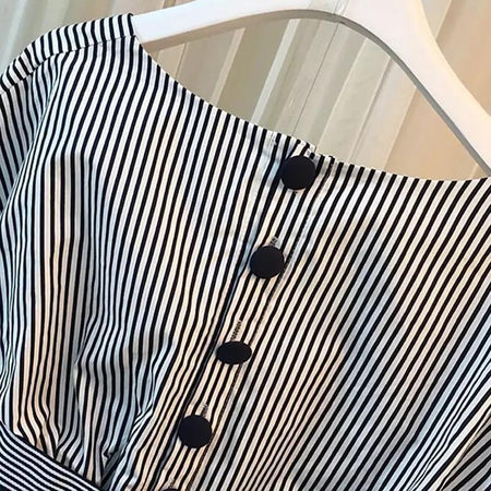 Bubble Sleeve Top With Belt - neckline and button close-up on hanger, black and white stripe - Miss Mosa By Akanksha