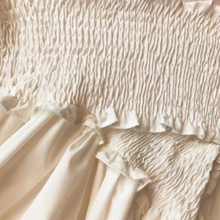 Catelyn Summer Dress - close-up of smocked bodice, cream - Miss Mosa By Akanksha