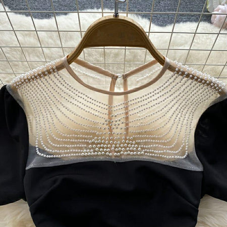 Delsa Statement Dress In Black - close-up of pearl neckline, black - Miss Mosa By Akanksha