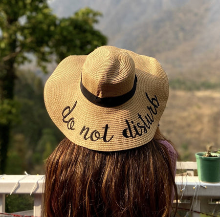 Do Not Disturb Straw Hat In Brown - lifestyle shot on model, brown - Miss Mosa By Akanksha
