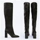 Isabelle Leather Boots - side shot on hanger, black - Miss Mosa By Akanksha