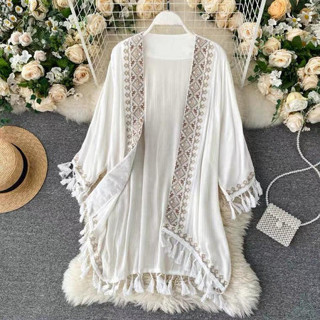 Leah Tasseled Cape - front shot on hanger, white - Miss Mosa By Akanksha